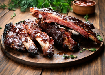 These oven-baked pork ribs glazed in rich BBQ sauce are perfect for World Whisky Day.