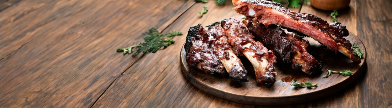 These oven-baked pork ribs glazed in rich BBQ sauce are perfect for World Whisky Day.